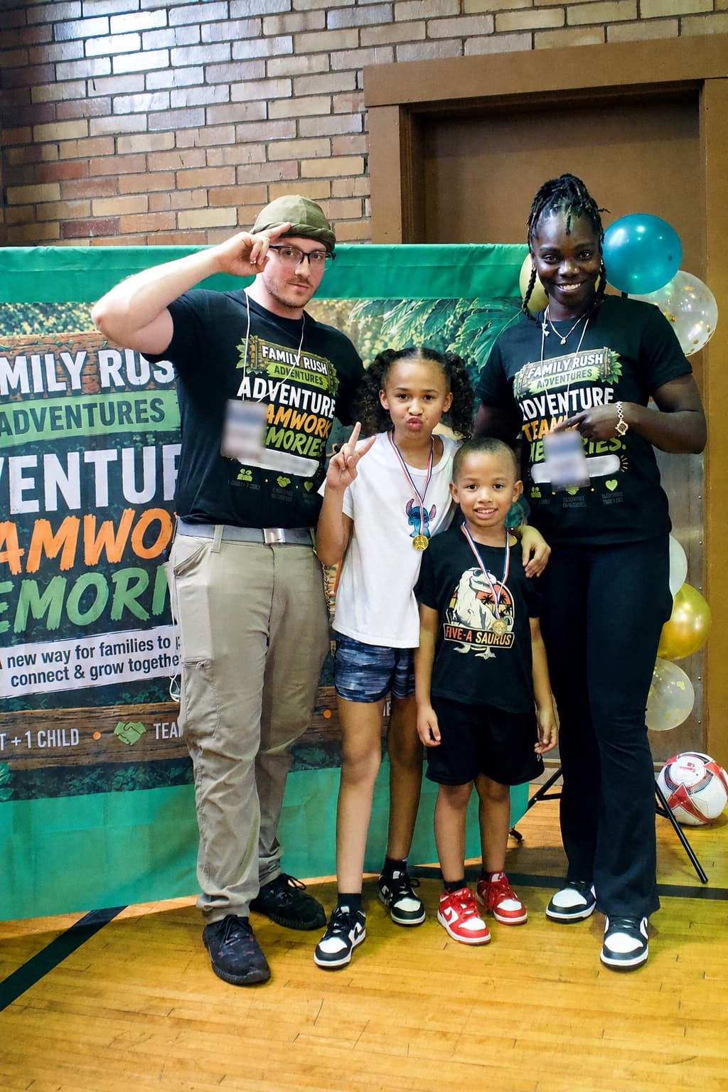 A Family Rush family team celebrating together after an adventure